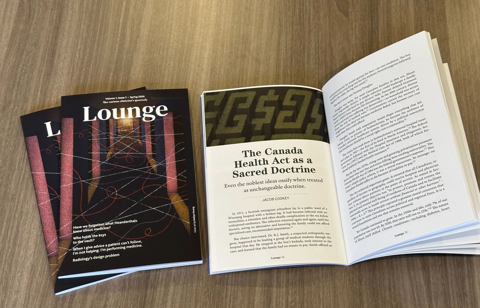 Lounge Issue 1 — Spring 2026, showing the cover by Kaitlyn Hwang and an interior spread from 'The Canada Health Act as a Sacred Doctrine'